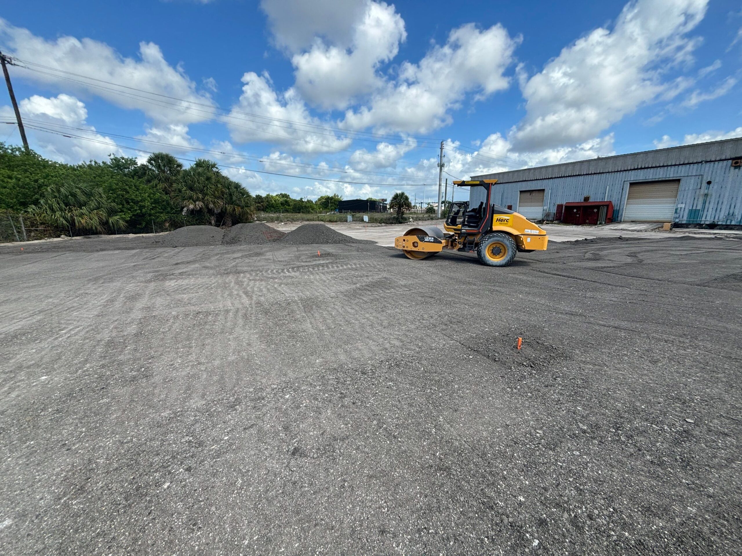 BHI Services asphalt compaction work at an industrial property in West Palm Beach, Florida